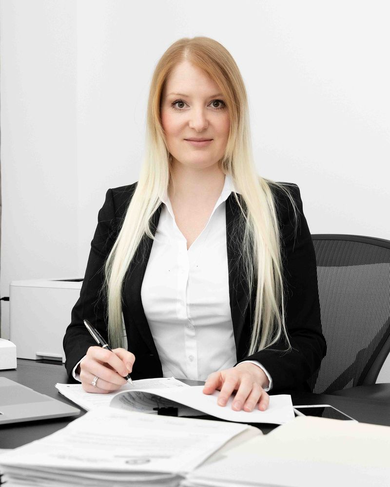 Olga Grigoryants, CPA, at her desk in Beverly Hills